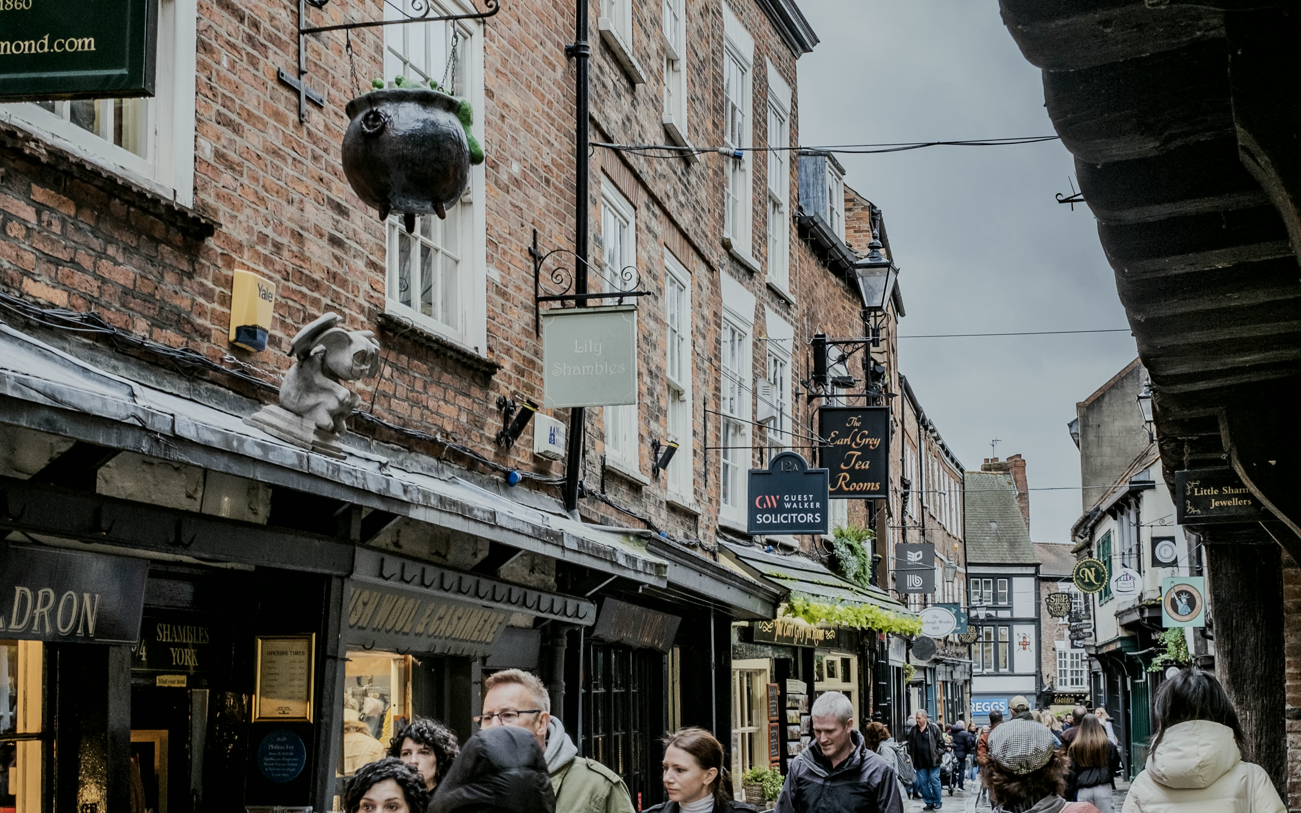 A busy UK high street of independent businesses