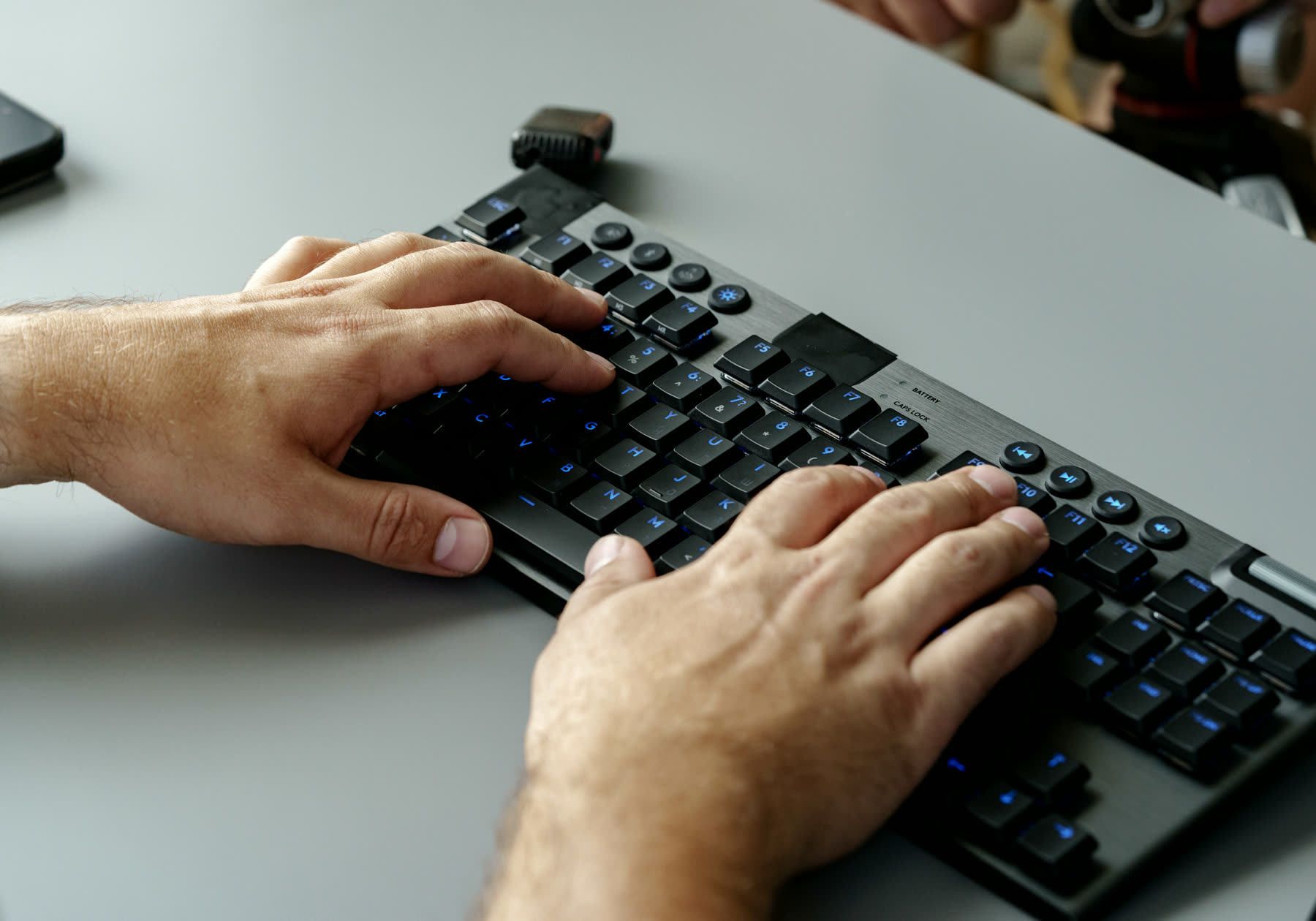 A keyboard and screen in use