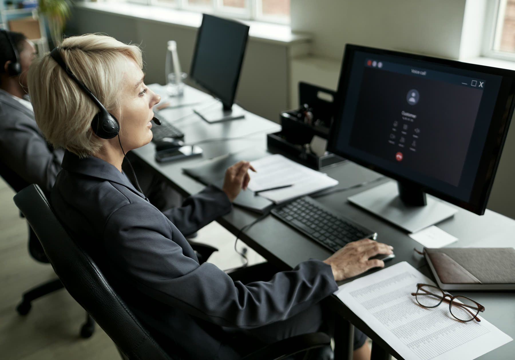 A controller at a dispatch desk