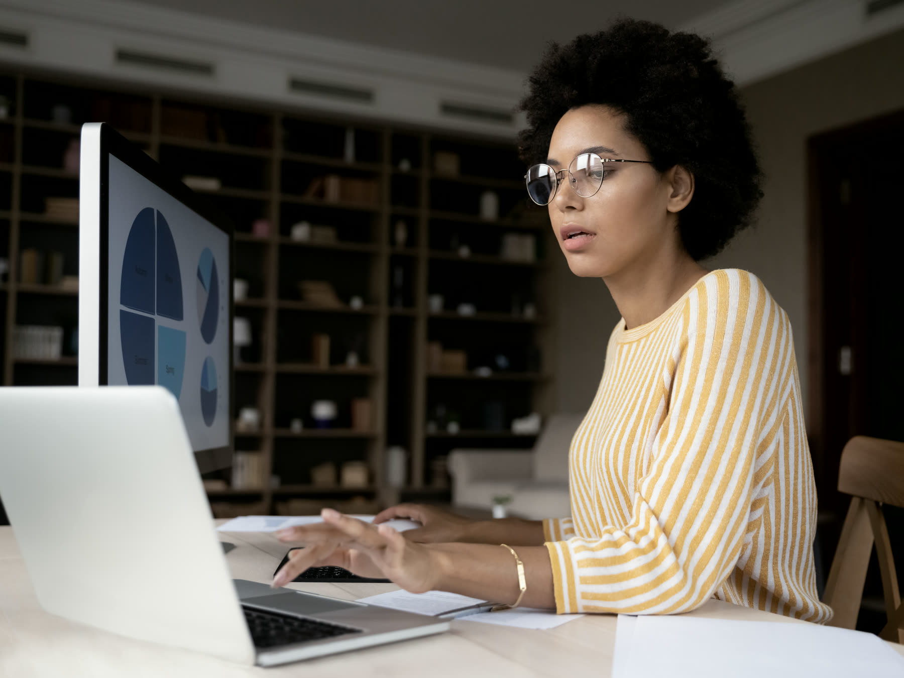 A marketer reviewing campaign performance on screen